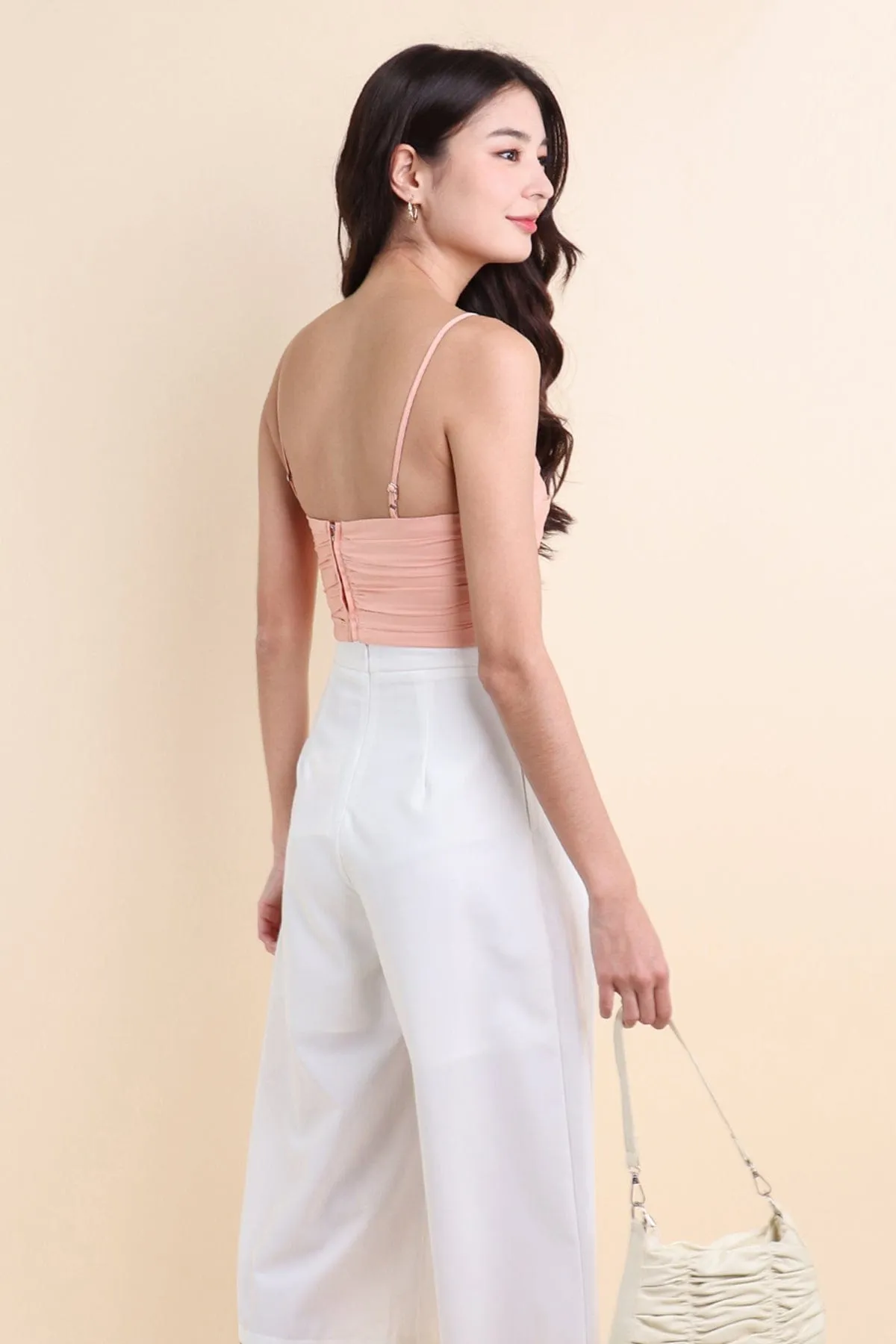 CAPRI RUCHED SATIN CROP TOP IN PEACH HEAVEN